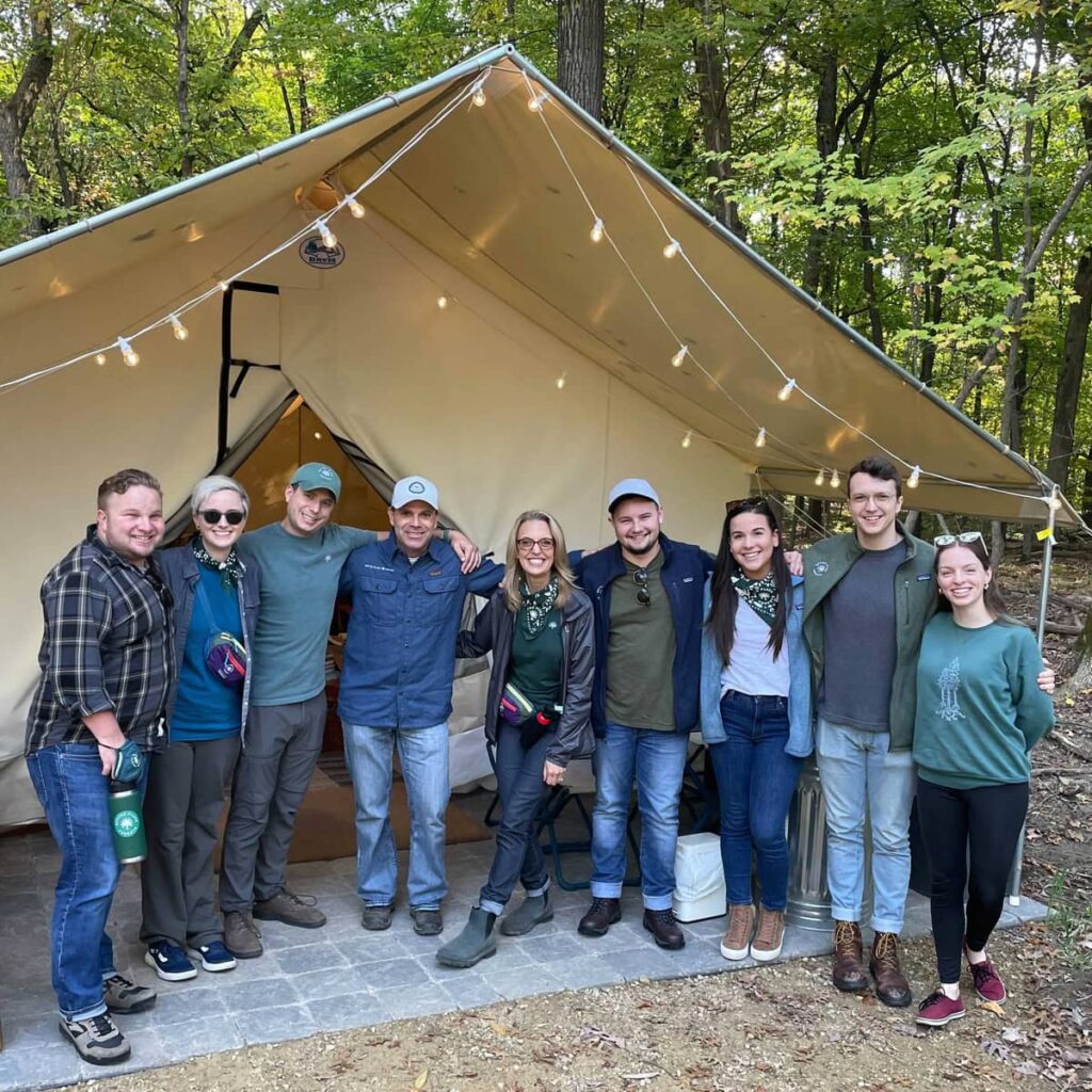 Forest guides gather at a tent in a memorial forest. A place to host a home memorial