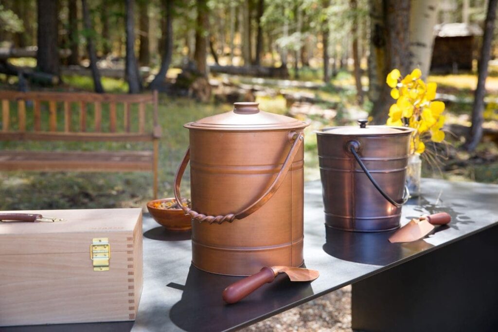 A Better Place Forests urn for ashes displayed in a peaceful memorial forest before a ceremony. There are keepsakes made from ashes that you can create