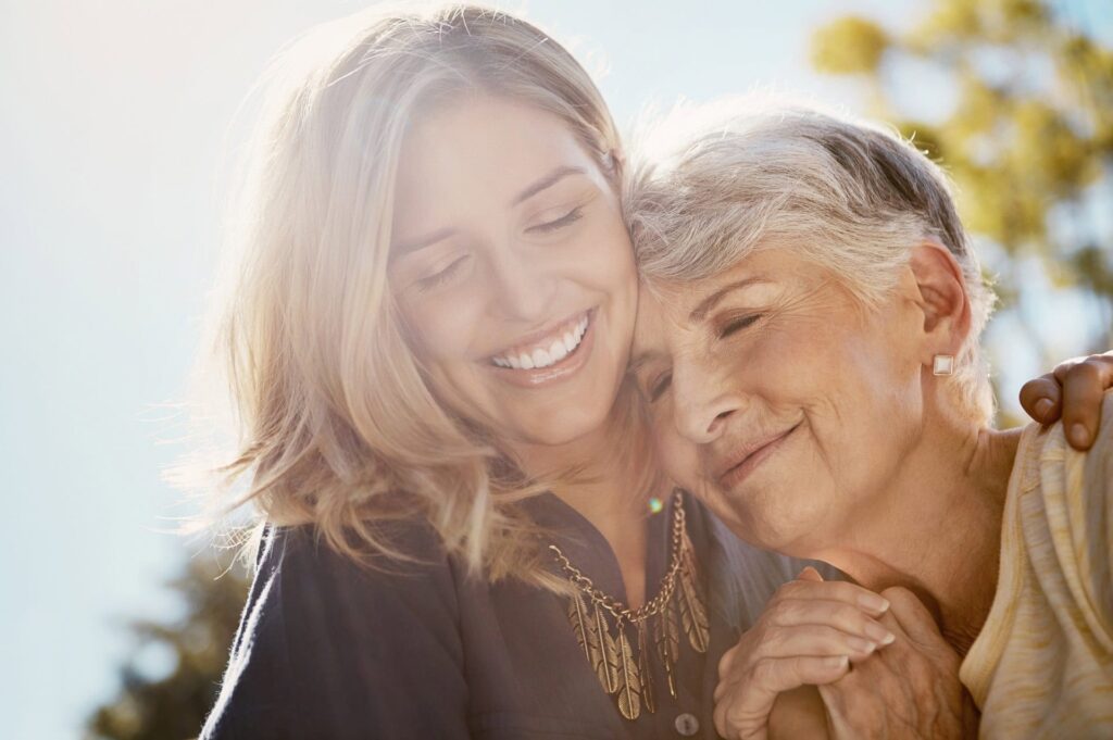 Mother and daughter embracing