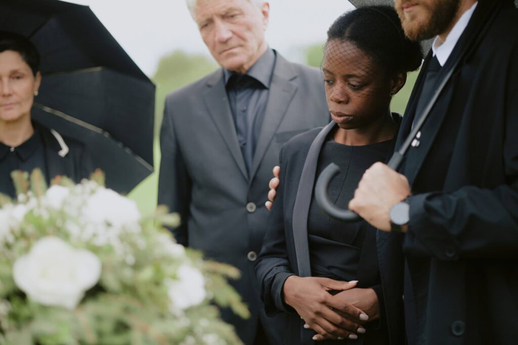 mourners gather for a death vigil