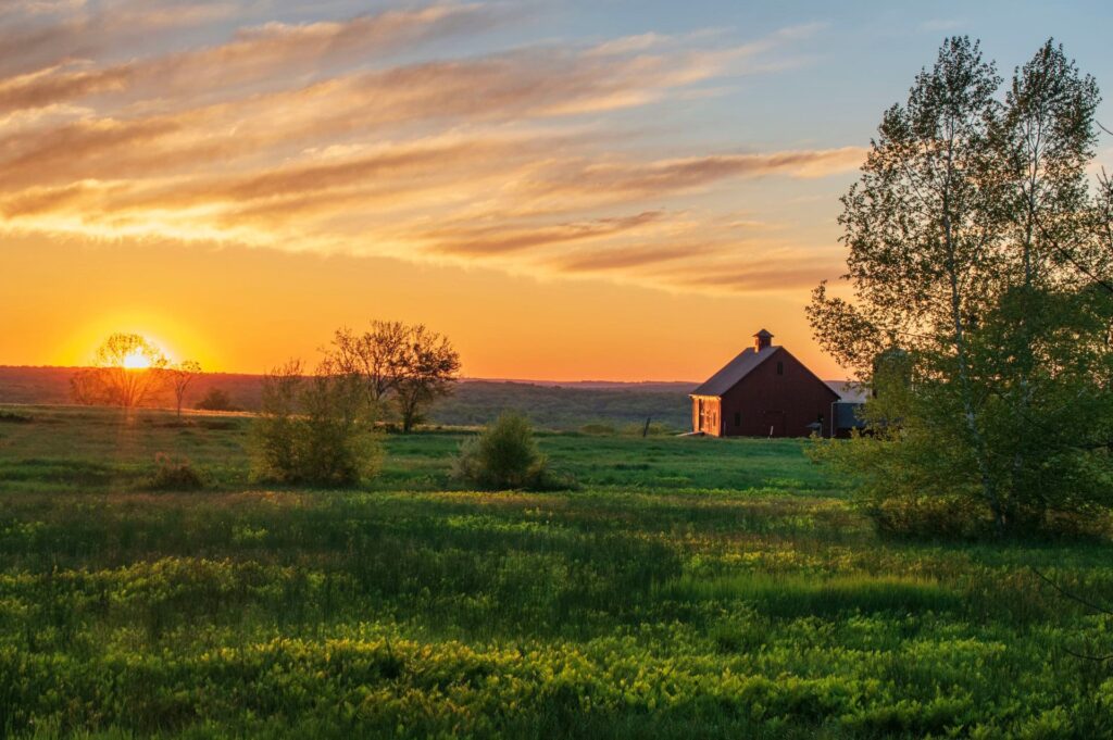 Sunrise over a New England farm