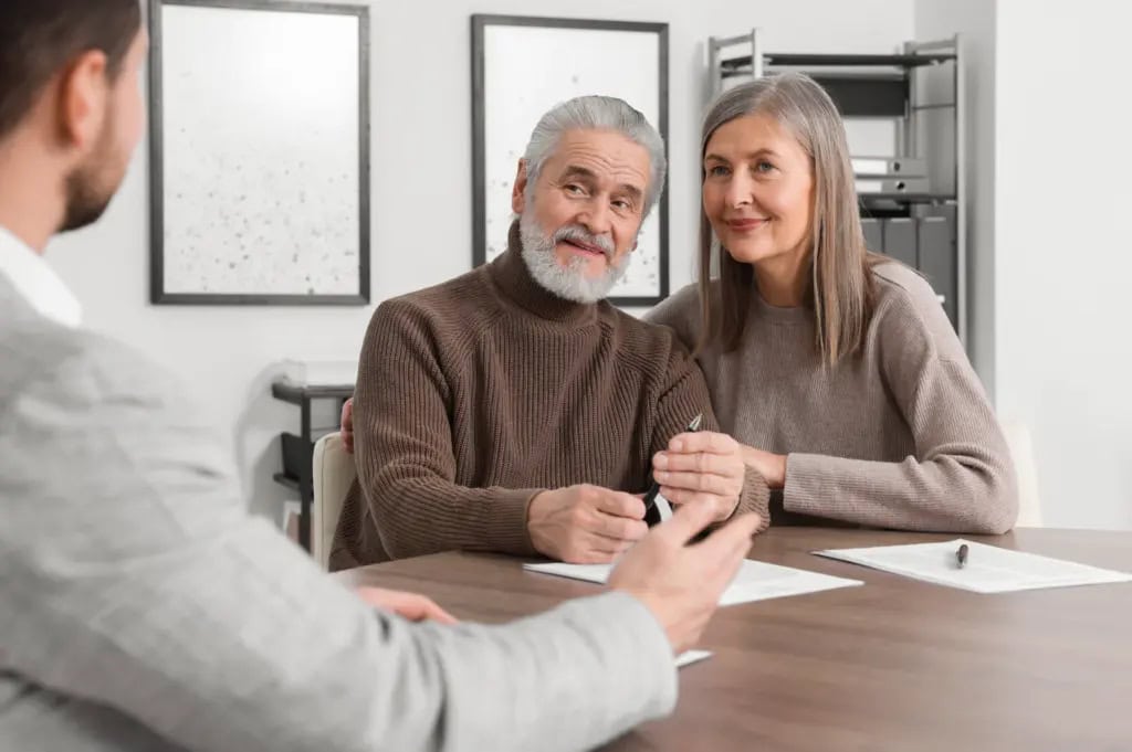 Elderly couple meets with a cremation provider 