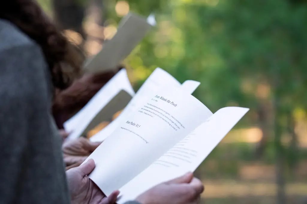A eulogy is read at a memorial service